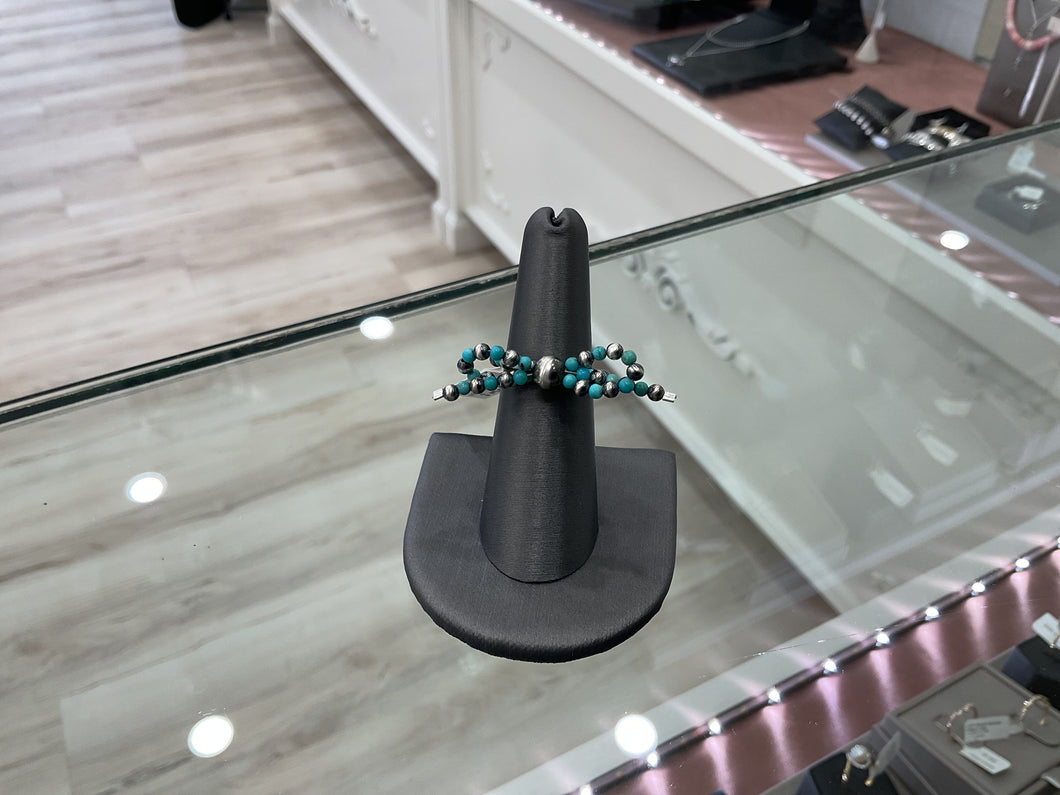 Turquoise and silver bead bow ring