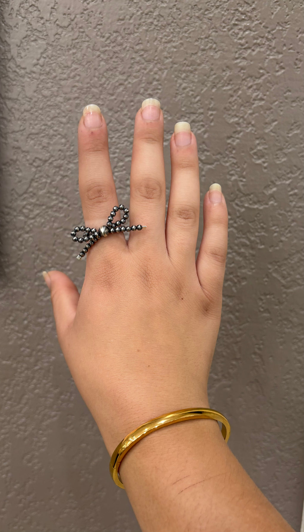 Sterling silver bead bow ring